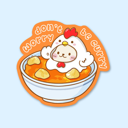 chicken in a bowl of curry with 'don't worry be curry' text 